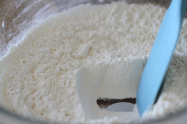 Make a well in dry mixture.